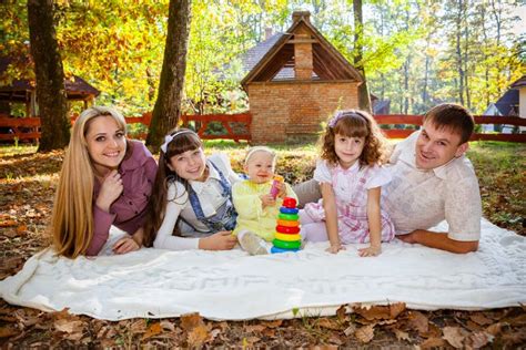 Smiling Family with Children Outdoors Stock Image - Image of family ...