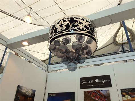 Here's a great shot of one of our fixtures hanging in a trade show booth. Have you visited us as ...