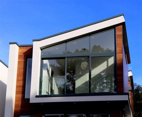 What Are the Benefits of Sloped Roofs for Homes?