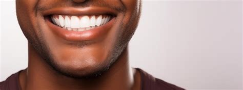 Premium AI Image | Mouth of a smiling young African American man on a ...