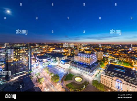 A night view of Birmingham city centre at night, showing Centenary Square and the new library of ...