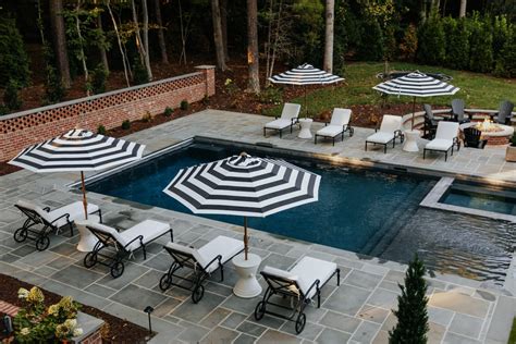 Our Sunken Fire Pit Paired With Black Adirondack Chairs