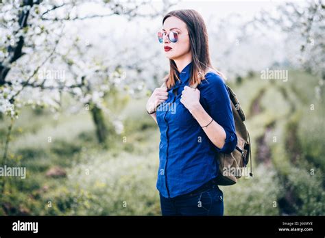 Young woman walking in nature Stock Photo - Alamy