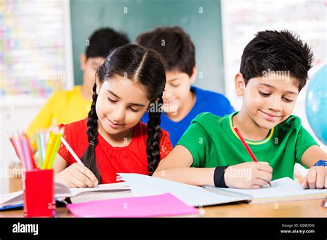 2 kids Girl and Boy Friends School Student Studying in a Classroom ...