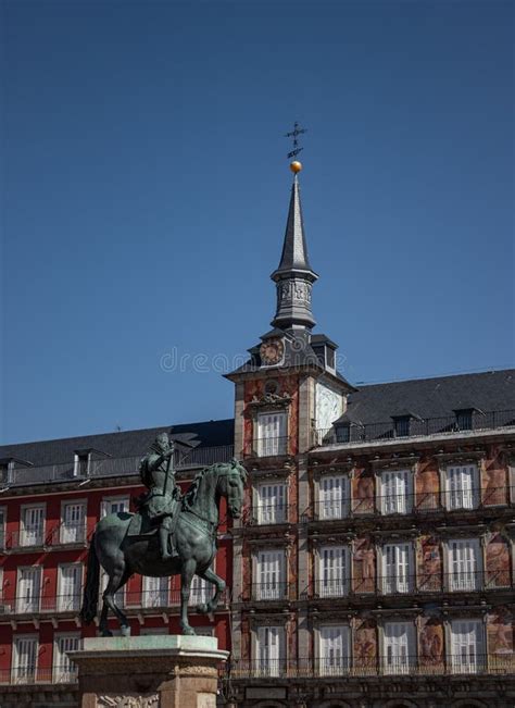 Vertical Shot of a Statue in Plaza Mayor Public Space and a Tower with ...