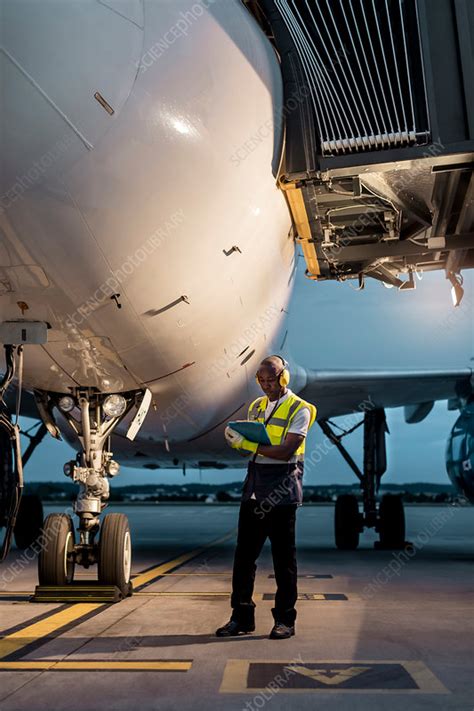 Airport ground crew worker - Stock Image - F017/3401 - Science Photo Library