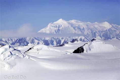 Mount Logan, Canada’s highest mountain, on a sunny summer’s day in the ...