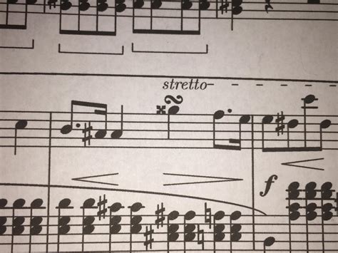 What does that symbol mean above the double sharp note? : r/piano