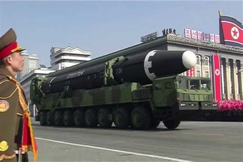 North Korean anniversary parade full of colour but without any intercontinental missiles - ABC News