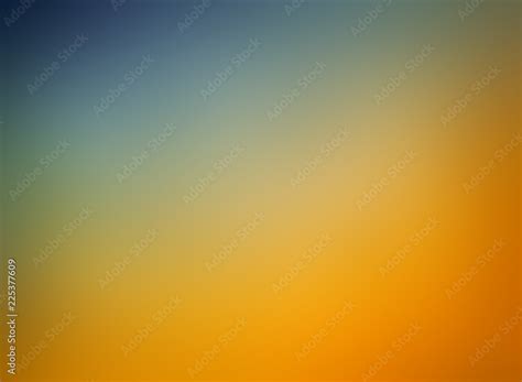 ภาพประกอบสต็อก orange blue and gold background blur, gradient blue sky blurred into orange ...