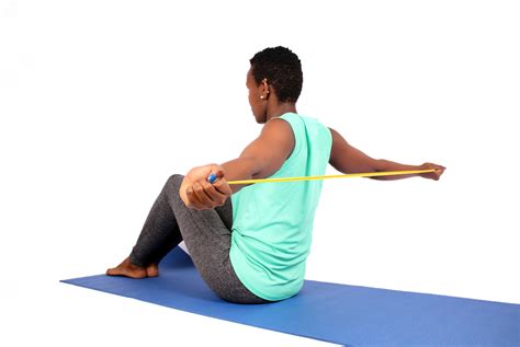 Fitness Woman Stretching Shoulders With Resistance Bands - High Quality Free Stock Images