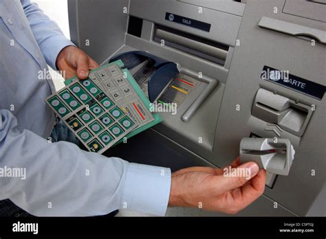 Skimming devices for manipulation a cash machine, ATM. MIcro cameras or keyboards register the ...