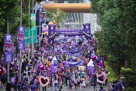 Over 13,000 people turn up at annual Purple Parade to show support for ...