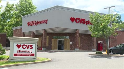 CVS in Boston's West Roxbury neighborhood boarded up ahead of planned protest - YouTube