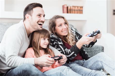 Parents play video games with their children Stock Photo 04 free download