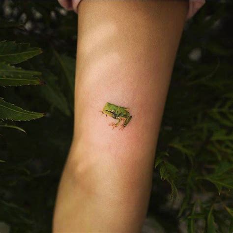 Lovely small frog tattoo - Tattoogrid.net