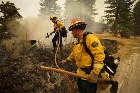 Firefighters overtaken by flames in California mountains