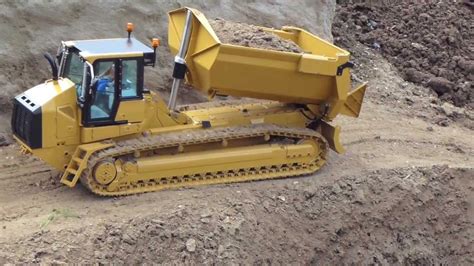 RC CATERPILLAR TRACK DUMPER AT THE CONSTRUCTION SITE - SCALEART - YouTube