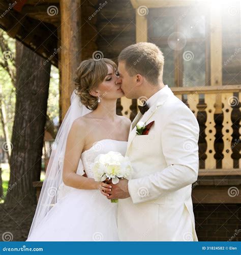 Bride and groom, kiss stock photo. Image of marry, bride - 31824582