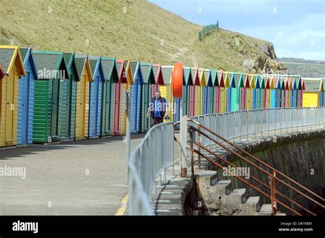 Whitby beach huts Stock Photo - Alamy