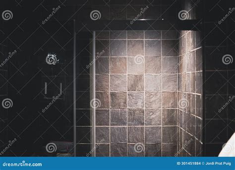 Squared Pattern Brick Wall in a Dark Black Bathroom Stock Photo - Image ...