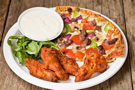 Best Pizza Wings Stock Photos, Pictures & Royalty-Free Images - iStock