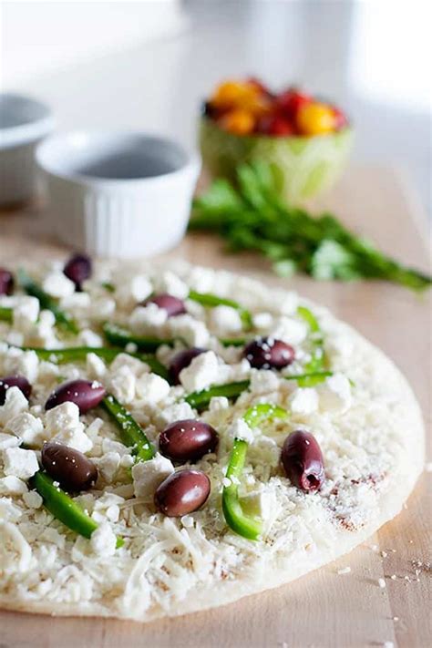 Greek Pizza Recipe (and Video) | Laura Fuentes