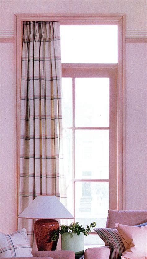 Neat single curtain set inside the window recess for a streamlined look ...