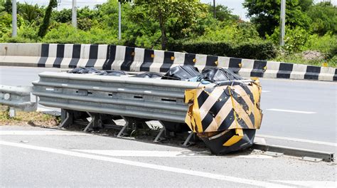 Crash Cushion or Impact Attenuator damaged by car crash 14841035 Stock Photo at Vecteezy