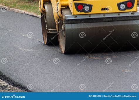 New Asphalt Road. Road Asphalt Works. Construction Works. Stock Photo ...