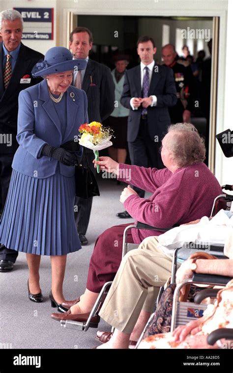 Queen Elizabeth II during a visit to a Hospital Stock Photo - Alamy