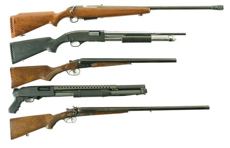 Five Shotguns -A) Mossberg Model 395K Bolt Action Shotgun B) Winchester ...