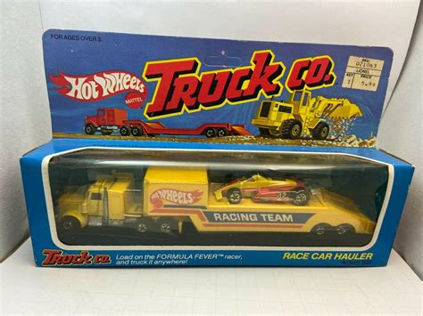 Hot Wheels TRUCK CO. RACE CAR HAULER YELLOW WITH FORMULA FEVER SEALED BOX | #3864975887