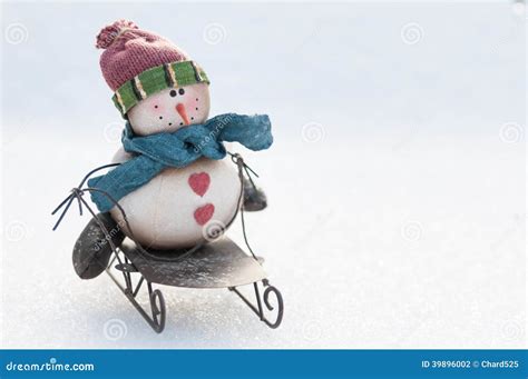 Snowman On A Sled Stock Photo - Image: 39896002