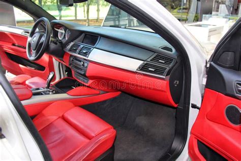 Cockpit of a White BMW with Red Interior on Display at Welt. Editorial ...