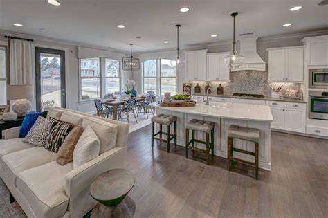 A sunny eating area adjoins this inviting kitchen. The Cadence plan ...