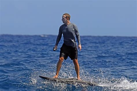 Mark Zuckerberg surfboards in Hawaii with way too much sunscreen