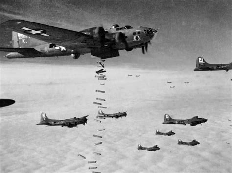 Bombs away during a daylight raid over Europe. As in this photograph, heavy cloud cover and the ...