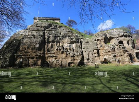 Nottingham Castle and caves in sandstone cliffs UK April 2017 Stock ...