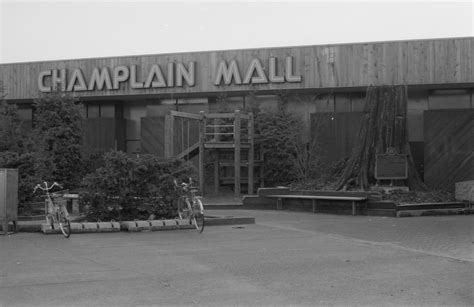 Champlain Mall - Western Red Cedar, with playground at entrance to mall - City of Vancouver Archives