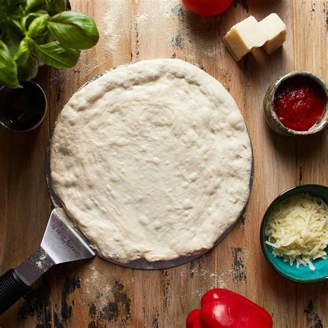 Should You Cook Pizza Dough Before Adding Toppings? - Pizzeria Ortica