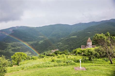 Premium Photo | Rainbow over the mountains in tatev, syunik province of armenia