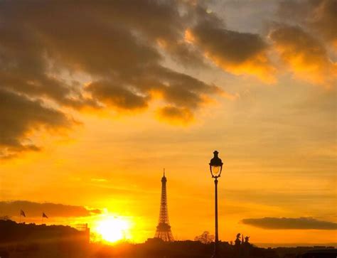 Premium Photo | Silhouette of eiffel tower at sunset