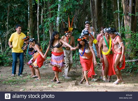 Suriname, Kwamalasamutu, Trio Indians in ceremonial dress dancing Stock Photo: 21527158 - Alamy