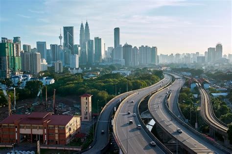 Premium Photo | Kuala Lumpur skyline with the Petronas Towers and other ...