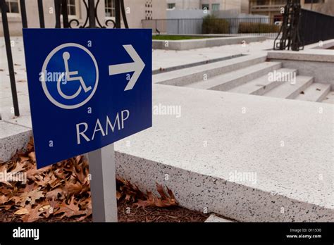 Wheelchair ramp sign Stock Photo - Alamy