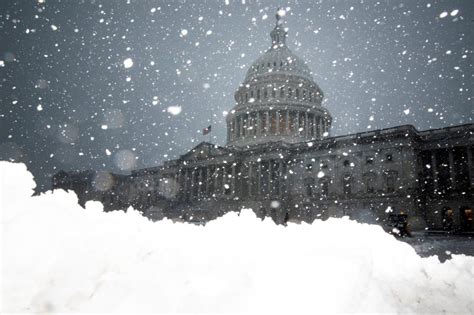 School, work, travel paused as snow blankets Washington D.C. | PBS News