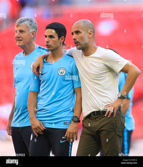 Manchester City Assistant Coach Mikel Arteta (left) and Manchester City ...