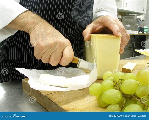 Slicing cheese stock image. Image of preparing, food, restaurant - 3327029