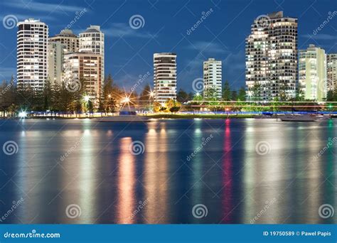 Modern city at night stock image. Image of reflection - 19750589